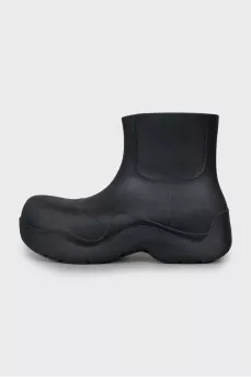Rubber boots with massive soles