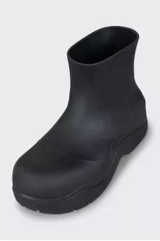 Rubber boots with massive soles