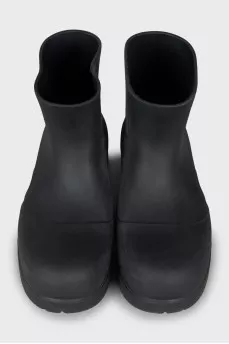 Rubber boots with massive soles