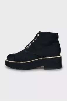 Textile boots decorated with beads
