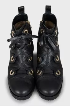 Leather boots with gold hardware
