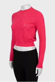 Pink jumper with perforated pattern