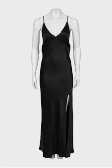 Dress with keychains and a slit