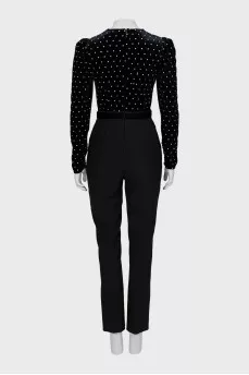 Black jumpsuit decorated with rhinestones