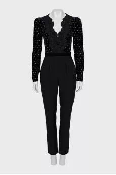 Black jumpsuit decorated with rhinestones