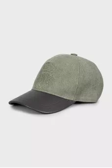Cap with leather visor and tag
