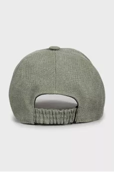 Cap with leather visor and tag