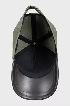 Cap with leather visor and tag