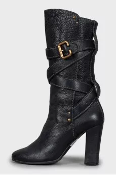 Leather boots with gold fittings