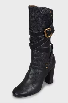 Leather boots with gold fittings