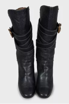 Leather boots with gold fittings