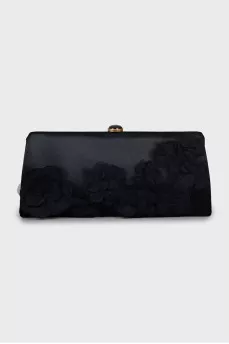 Textile clutch decorated with flowers