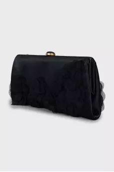 Textile clutch decorated with flowers