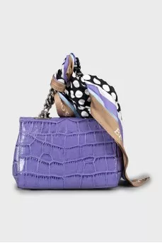 Crossbody bag decorated with a scarf