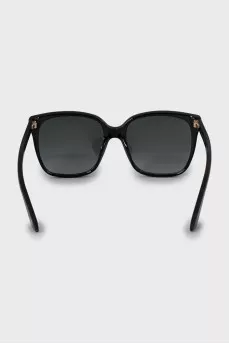 Black sunglasses with gold logo