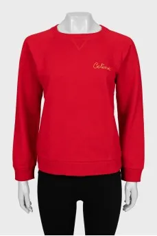 Red sweatshirt with gold logo