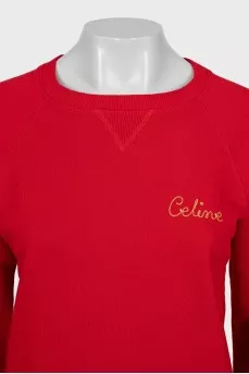 Red sweatshirt with gold logo