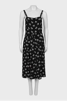 Jumpsuit with straps in the signature print