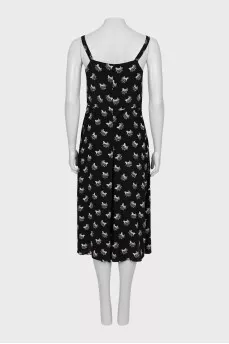 Jumpsuit with straps in the signature print