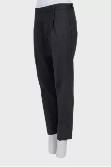 Grey tapered trousers with arrows