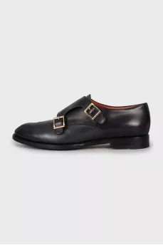 Leather shoes with gold fittings