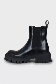 Black boots with a textured sole