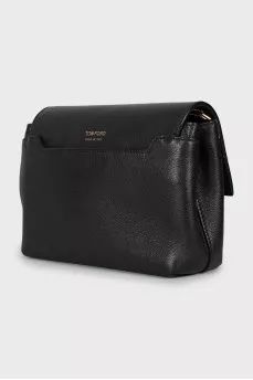 Leather bag with gold clasp