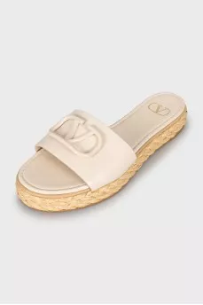 Leather flip flops with raffia soles