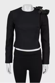 Fitted jacket with shoulder decoration