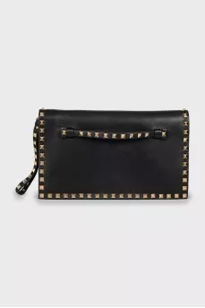 Leather clutch with gold studs