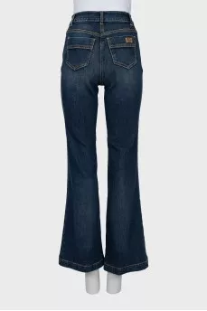 Flared jeans with gold hardware