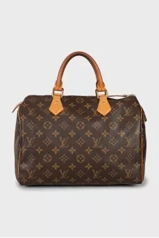 Speedy bag with branded hardware