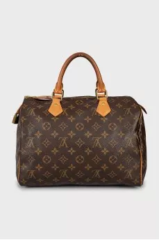 Speedy bag with branded hardware