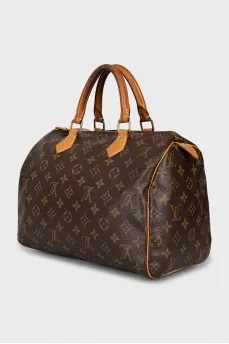 Speedy bag with branded hardware