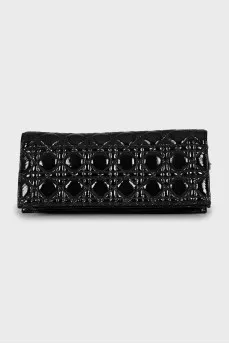 Leather clutch with branded decor