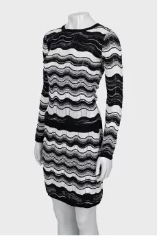 Suit with a fitted skirt