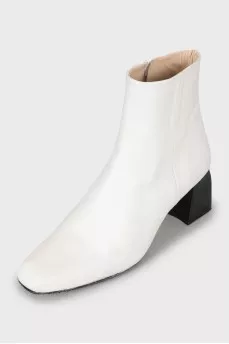 Black and white leather ankle boots