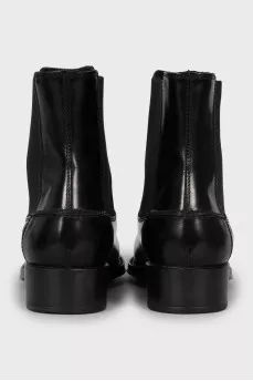 Black leather boots with textile inserts