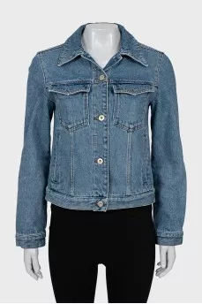 Denim jacket with decorated sleeves