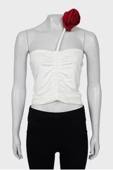 Top decorated with drapery and tag