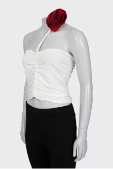Top decorated with drapery and tag