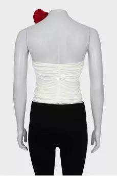 Top decorated with drapery and tag