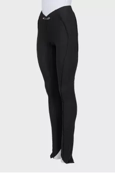 Trousers decorated with a pin