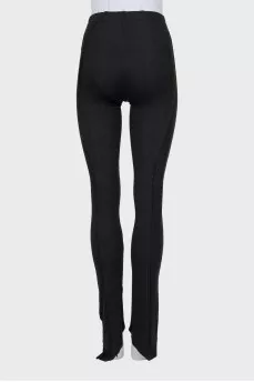 Trousers decorated with a pin