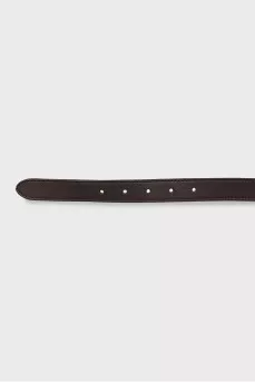 Leather belt with orange buckle