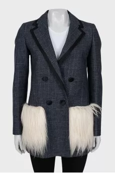 Jacket with patch pockets decorated with fur