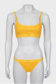 Orange swimsuit with tag