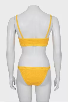 Orange swimsuit with tag