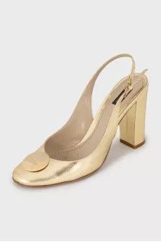 Leather shoes in gold color