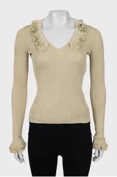 Jumper with frills on sleeves and collar
